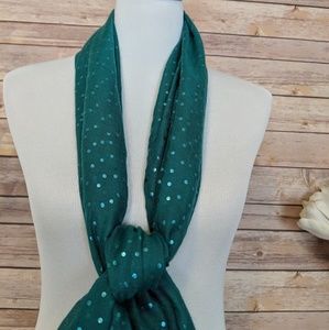 Dark teal scarf with small shimmery dots throughou